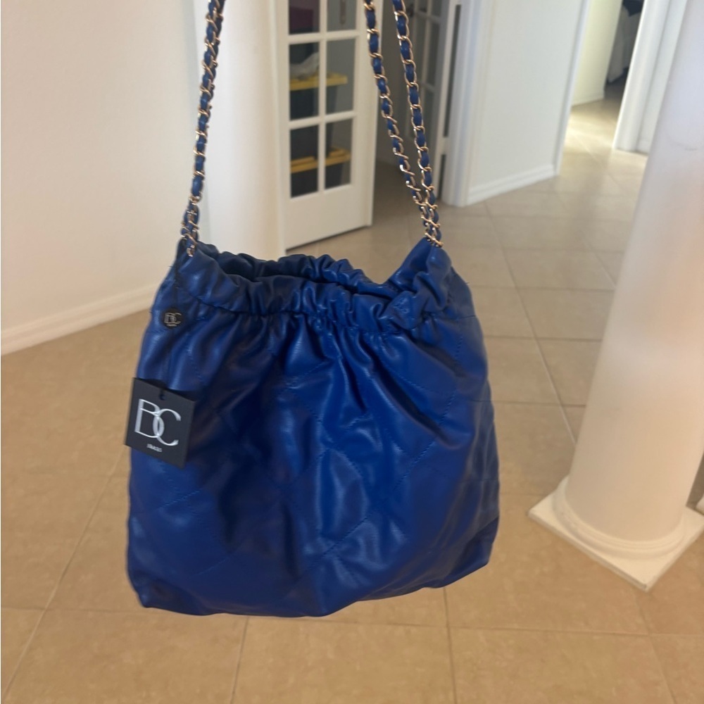 Gorgeous, bright blue tote with the matching makeup pouch